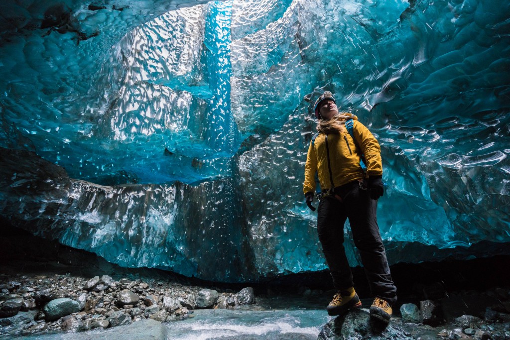 Wednesday 25th November 2015, Vatnajökull national park, Iceland: Photographer Mikael Buck with assistance from renowned local Icelandic guide Einar Runar Sigurdsson, explored the frozen world of Vatnajökull glacier in Iceland using Sonys world first back-illuminated full-frame sensor  which features in the ?7R II camera. His images were taken without use of a tripod or any image stitching techniques in photoshop. This was made possible through Sonys new sensor technology, allowing incredibly detailed low-light hand held photography. Previously images this detailed would have required carrying bulky equipment to the caves, some of which can require hiking and climbing over a glacier for up to two hours to to access. This picture: Guide Helen Maria is pictured inside the waterfall cave PR Handout - editorial usage only. Photographer's details not to be removed from metadata or byline. For further information please contact Rochelle Collison at Hope & Glory PR on 020 7014 5306 or rochelle.collison@hopeandglorypr.com Copyright: © Mikael Buck / Sony 07828 201 042 / mikaelbuck@gmail.com