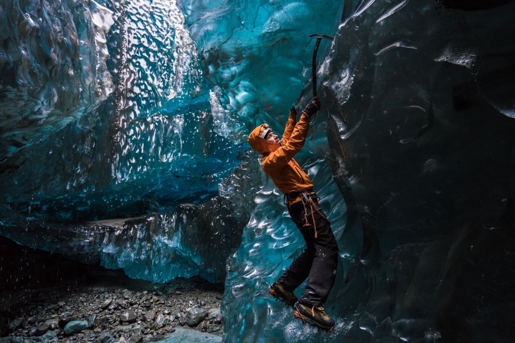 Wednesday 25th November 2015, Vatnajökull national park, Iceland: Photographer Mikael Buck with assistance from renowned local Icelandic guide Einar Runar Sigurdsson, explored the frozen world of Vatnajökull glacier in Iceland using Sonys world first back-illuminated full-frame sensor  which features in the ?7R II camera. His images were taken without use of a tripod or any image stitching techniques in photoshop. This was made possible through Sonys new sensor technology, allowing incredibly detailed low-light hand held photography. Previously images this detailed would have required carrying bulky equipment to the caves, some of which can require hiking and climbing over a glacier for up to two hours to to access. This picture: Guide Einar Runar Sigurdsson is seen ice climbing inside the 'Waterfall Cave' PR Handout - editorial usage only. Photographer's details not to be removed from metadata or byline. For further information please contact Rochelle Collison at Hope & Glory PR on 020 7014 5306 or rochelle.collison@hopeandglorypr.com Copyright: © Mikael Buck / Sony 07828 201 042 / mikaelbuck@gmail.com